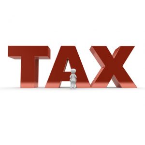 Image is the word tax in giant red letters.
