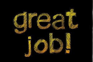 Image is the words 'great job' written in gold on a black background.