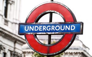 Image is a red and blue sign that reads "underground."
