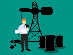 Image is a drawing of a man in a hardhat with papers standing next to an oil pumping unit.