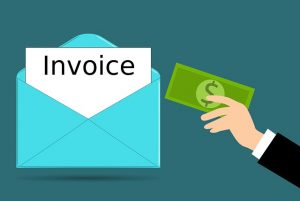 Image is an illustration of an invoice in an envelope and someone holding money.