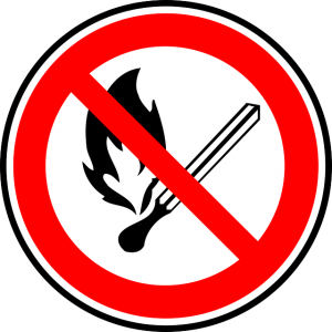 Image is a no-burning sign, with picture of match and flame surrounded by red circle with a slash through it.