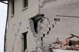 Image shows the earthquake damage on the corner of a building.