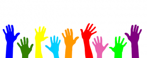 Image is a line of volunteer hands in different colors.