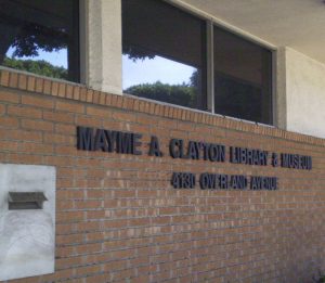 Image is the outside of the old Mayme A. Clayton Library and Museum
