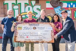 Image is of Tito's Tacos donating a check to Culver City Arts Foundation.